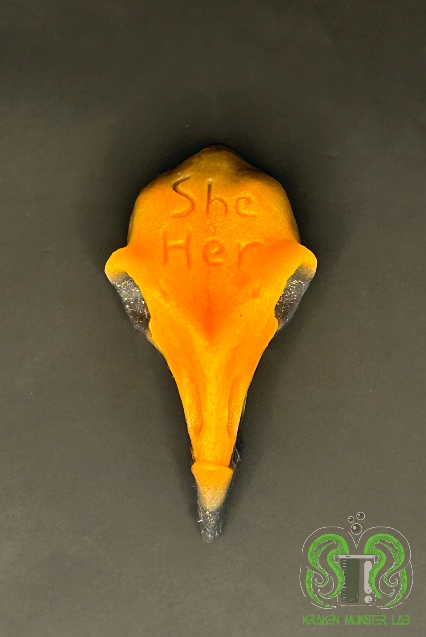 She/her - Cronoun Squish - Lava - Orange & Black